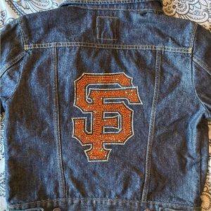 Levi’s Rhinestone Denim Jacket has missing rhinestones, as photos illustrate.